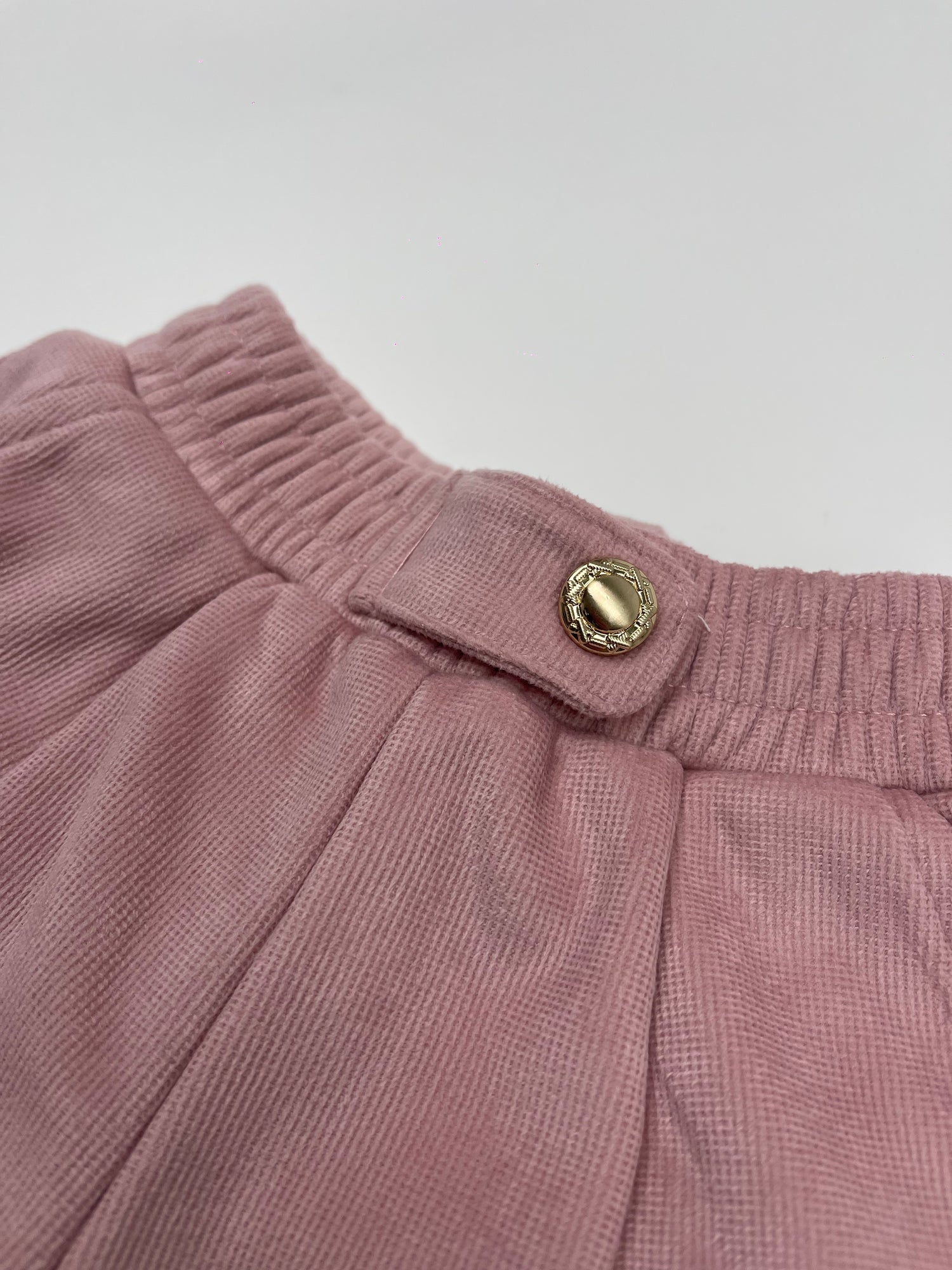 Pantaloncino rosa in velluto bottoni oro