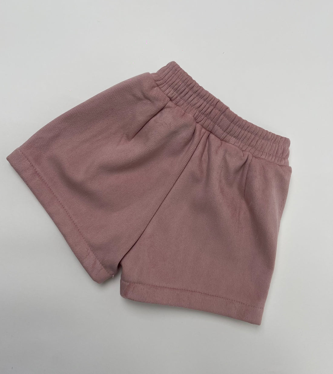 Pantaloncino rosa in velluto bottoni oro